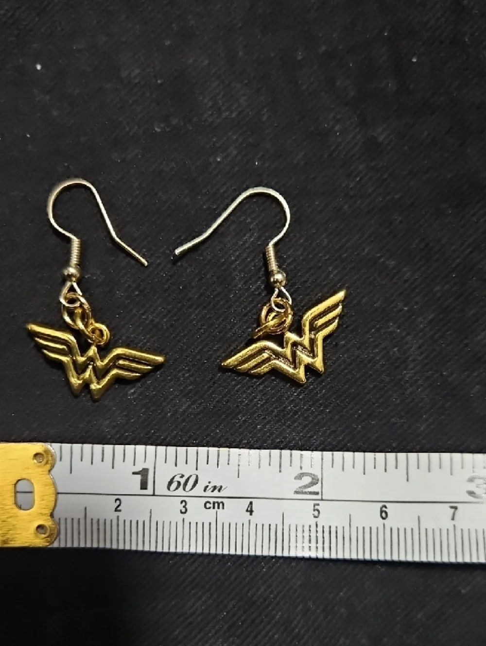 DC Comics Wonder Woman Logo Dangle Earrings Gold Tone